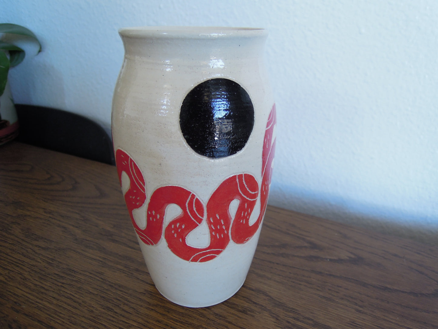 red snake vase