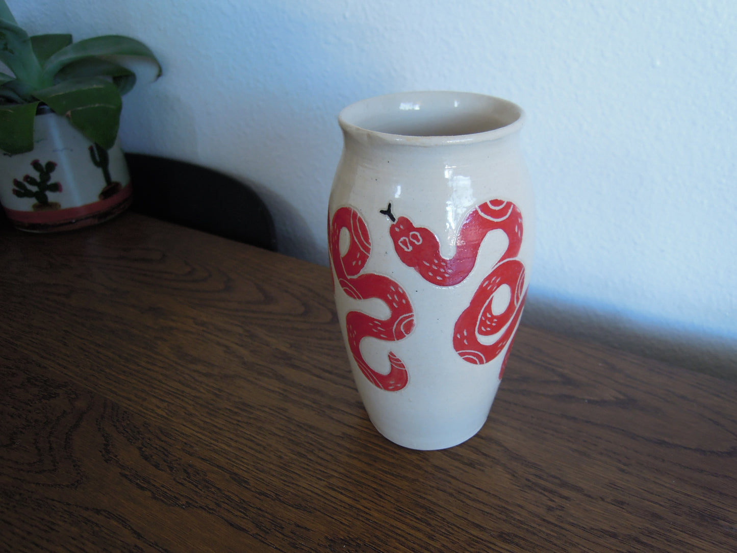 red snake vase